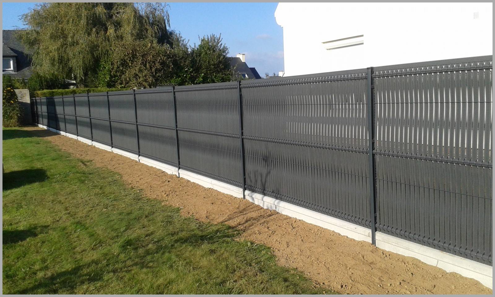 Entreprise spécialisée pour la pose clôture en panneau grille rigide à Yvetot 