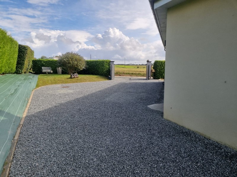 Réfection d'une entrée de maison en gravelle par une entreprise paysagiste secteur Pavilly